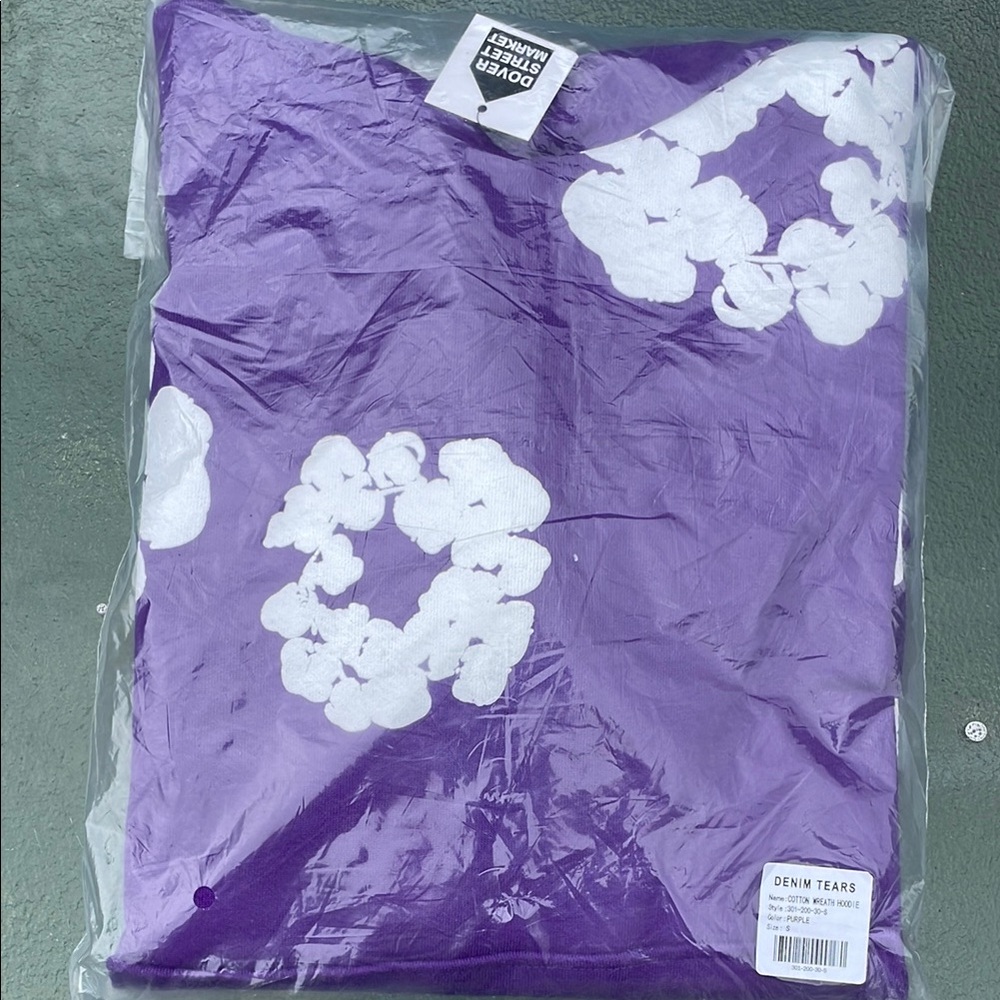 Purple Denim Tears Hoodie with White Floral Design